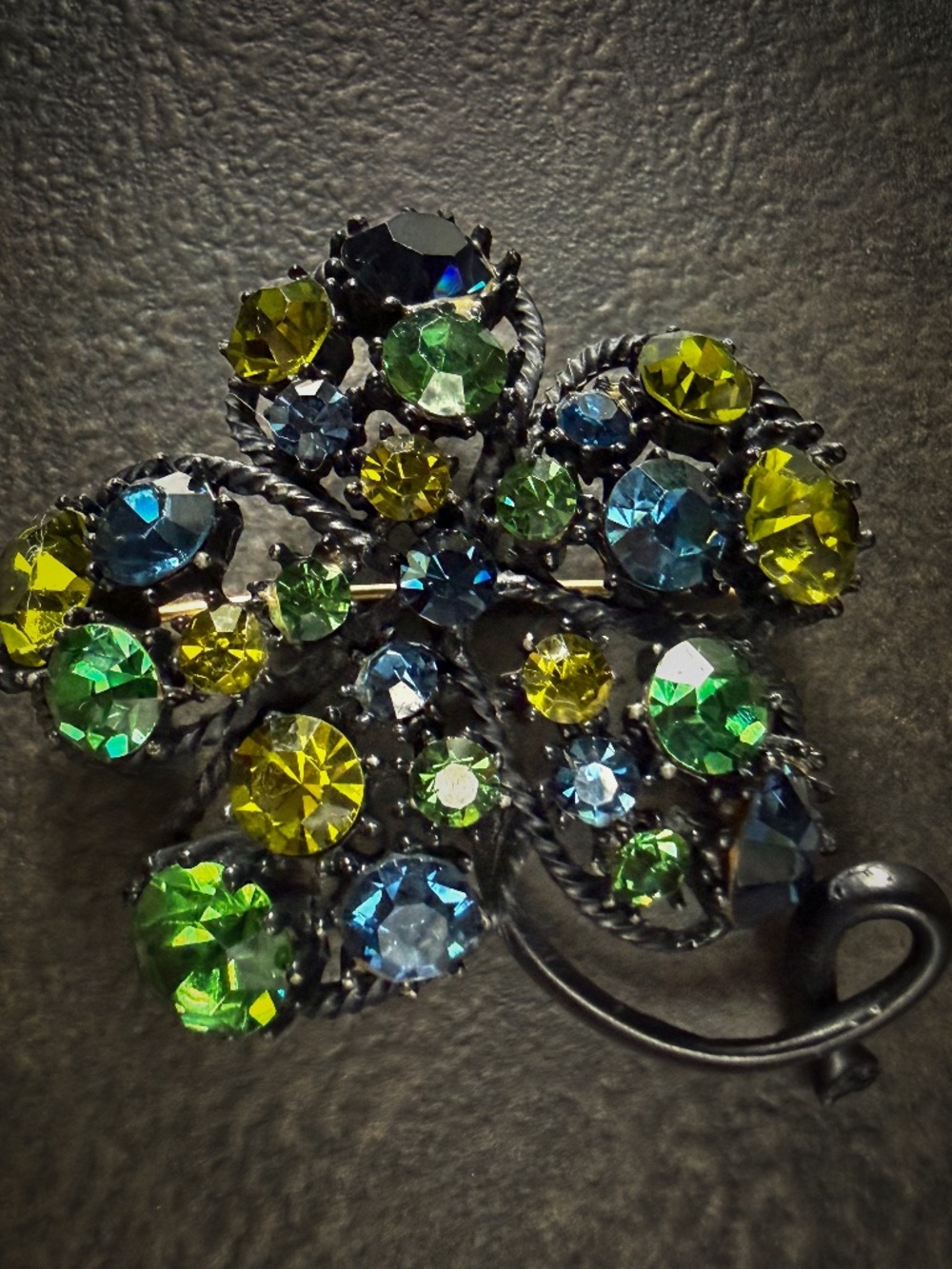 Vintage Green Rhinestone Black Filigree Flower Brooch